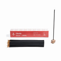 Set including the red Othership incense box, black incense sticks, and marbled stone holder.